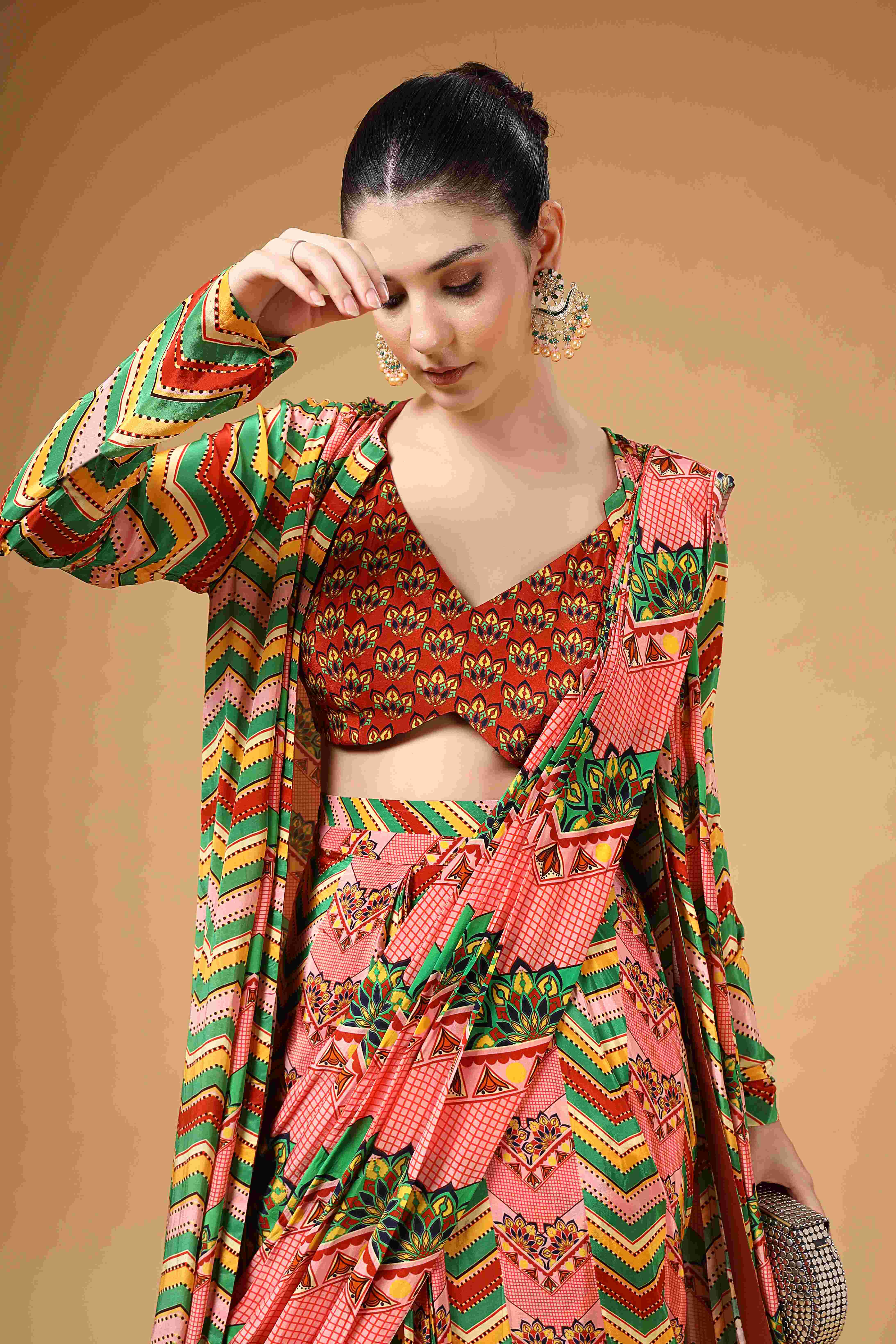 A model showcasing Zyona Multi Colour Cape Drape Saree by Miku Kumar from Miku Kumar's collection