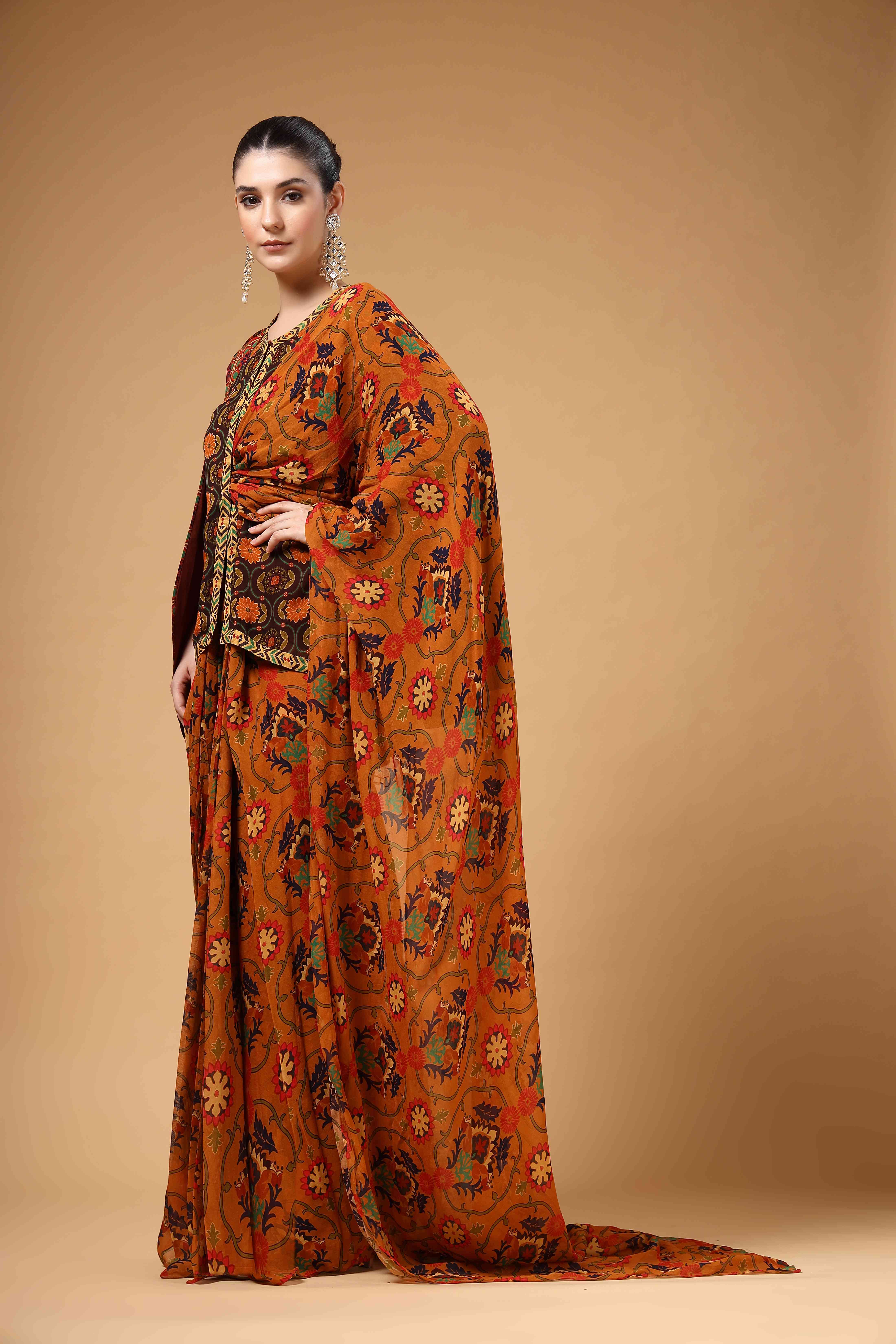 A model showcasing Ravya Brown Drape Saree by Miku Kumar from Miku Kumar's collection