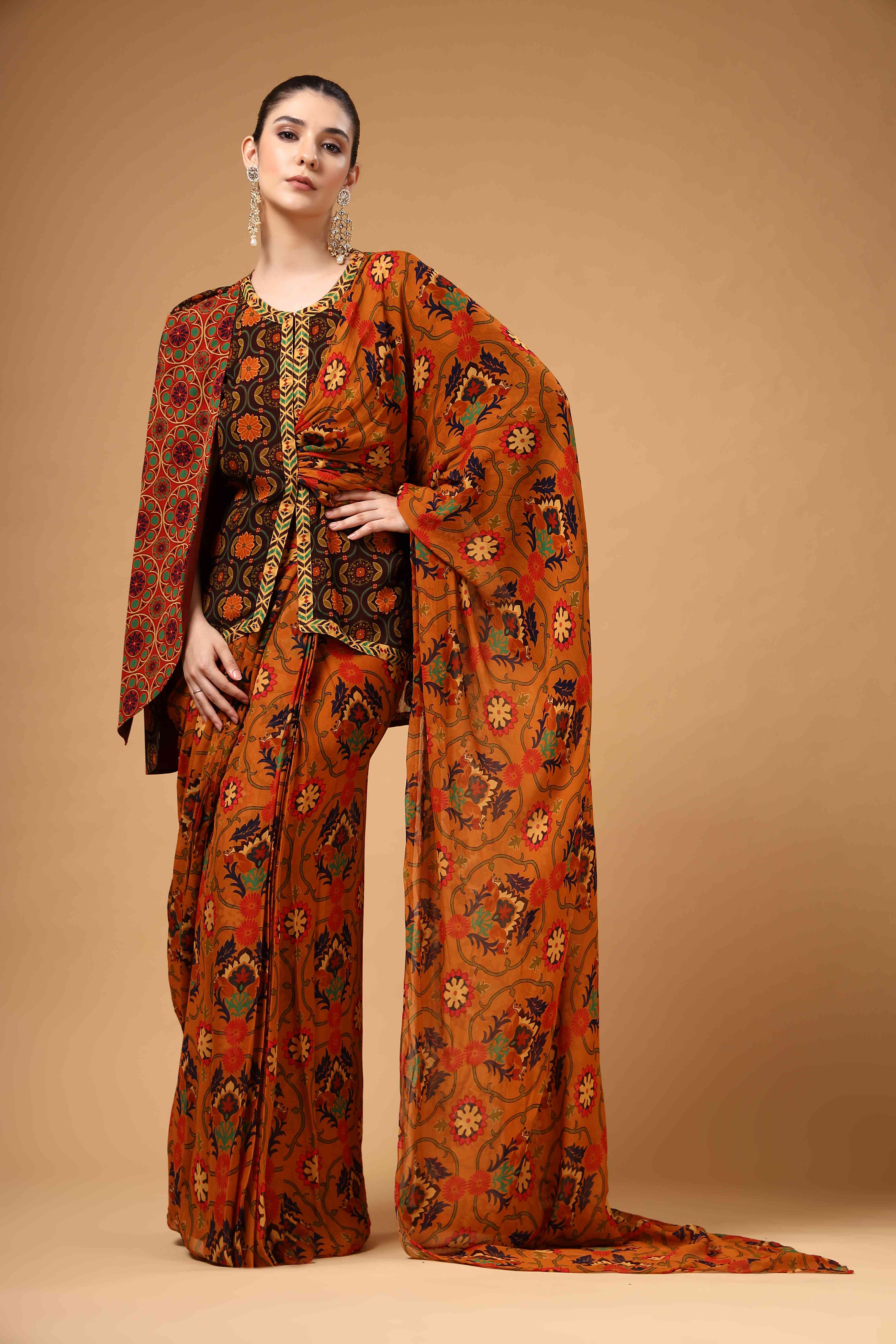 A model showcasing Ravya Brown Drape Saree Feature image by Miku Kumar from Miku Kumar's collection