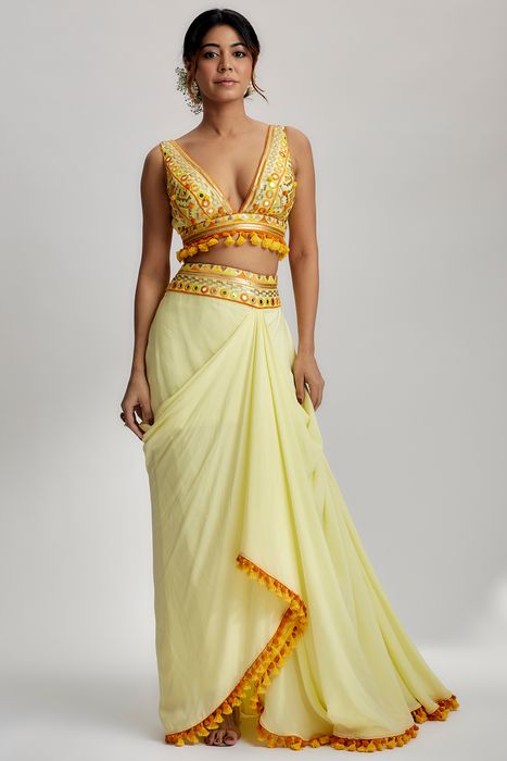 A model showcasing Yellow Ruhi Drape Skirt Set by Gopi Vaid from Gopi Vaid's collection