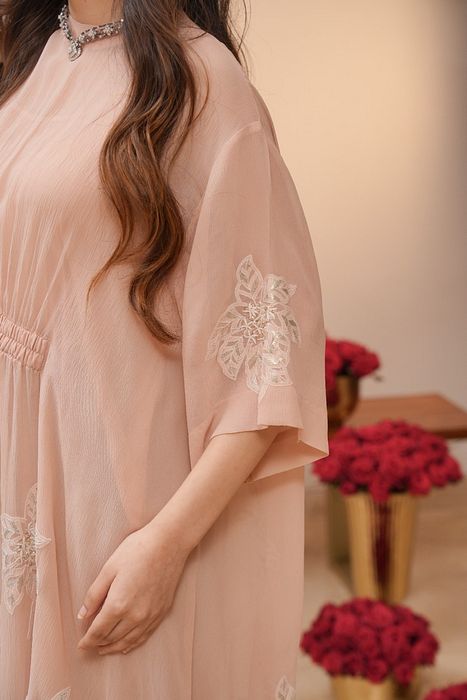 A model showcasing Light Pink Chikan Dress by Myra By Anju Narian from Myra By Anju Narian's collection A model showcasing Light Pink Chikan Dress by Myra By Anju Narian from Myra By Anju Narian's collection