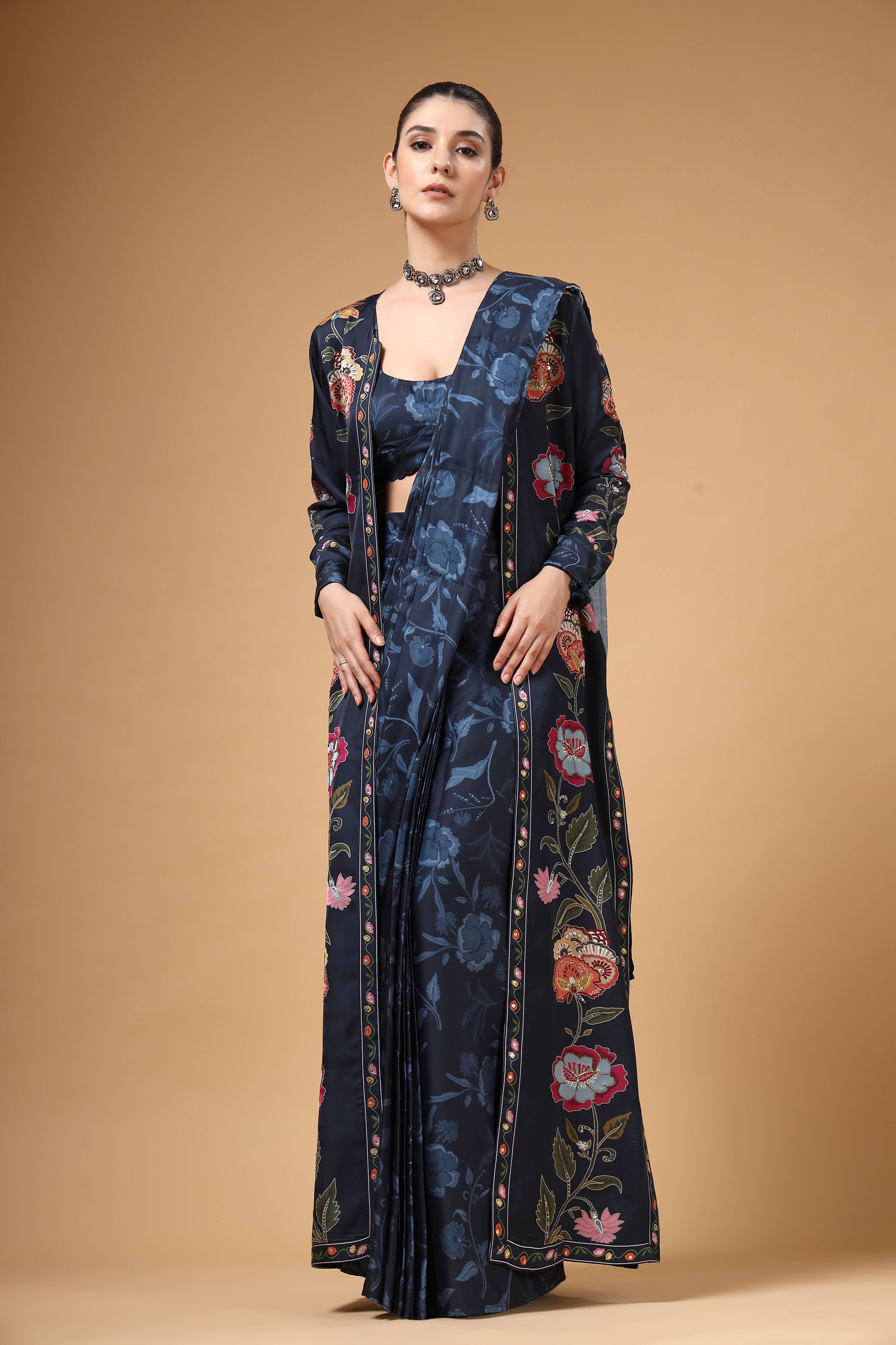 A model showcasing Elvya Navy Blue Cape Drape Saree Set Feature image by Miku Kumar from Miku Kumar's collection
