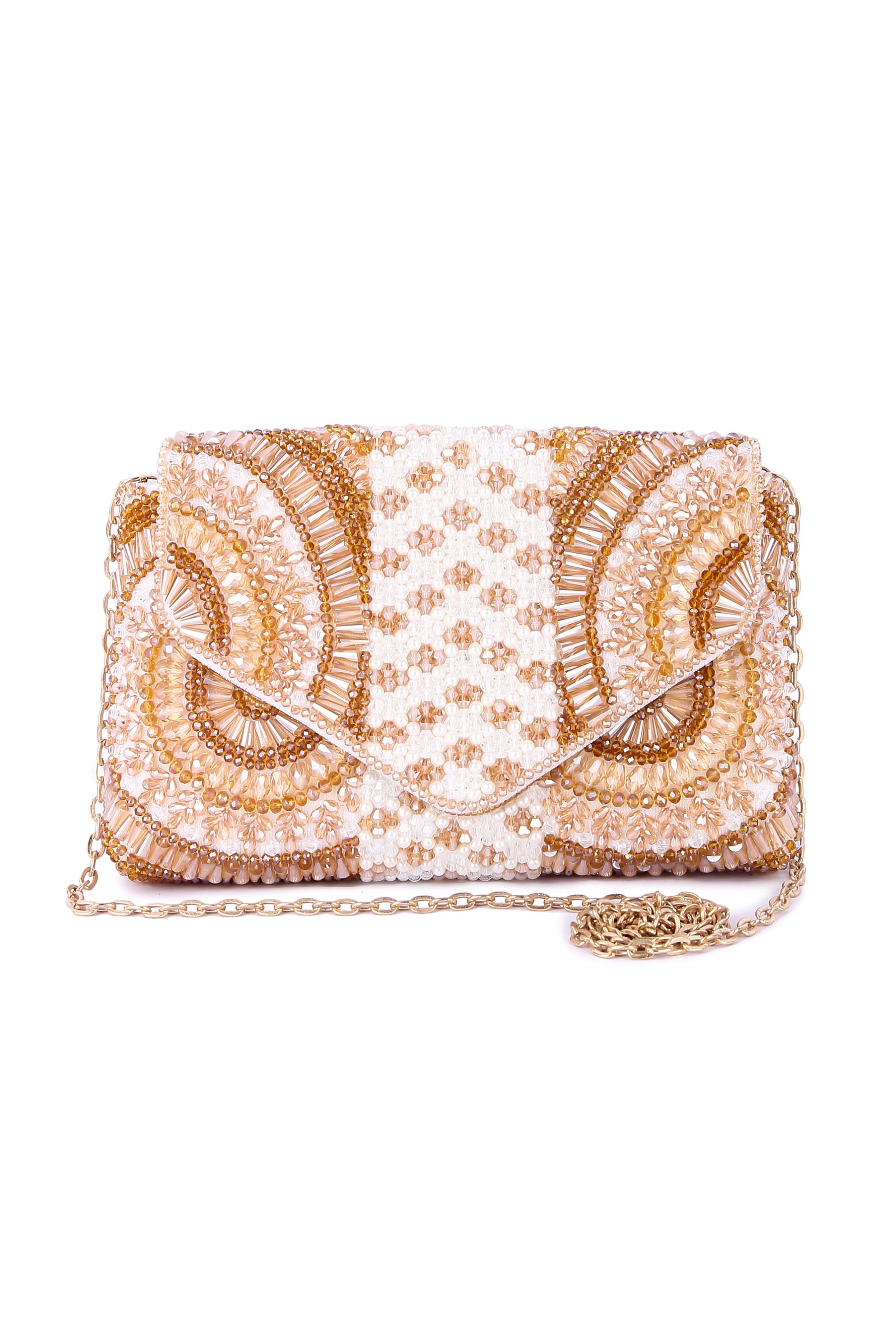 A model showcasing Shazeeb Golden Clutch Feature image by The Purple Sack from The Purple Sack's collection