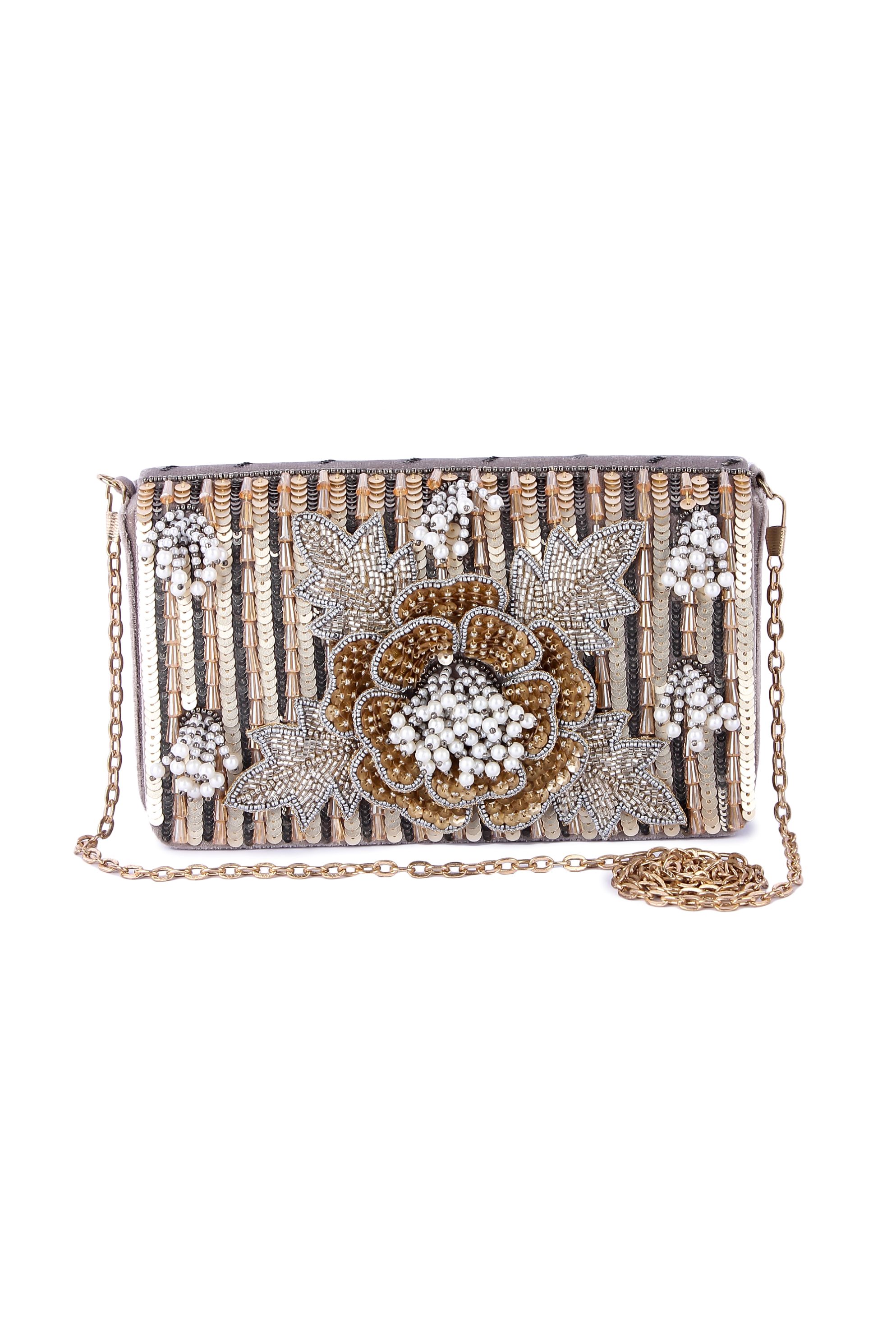A model showcasing Mahdaba Clutch by The Purple Sack from The Purple Sack's collection