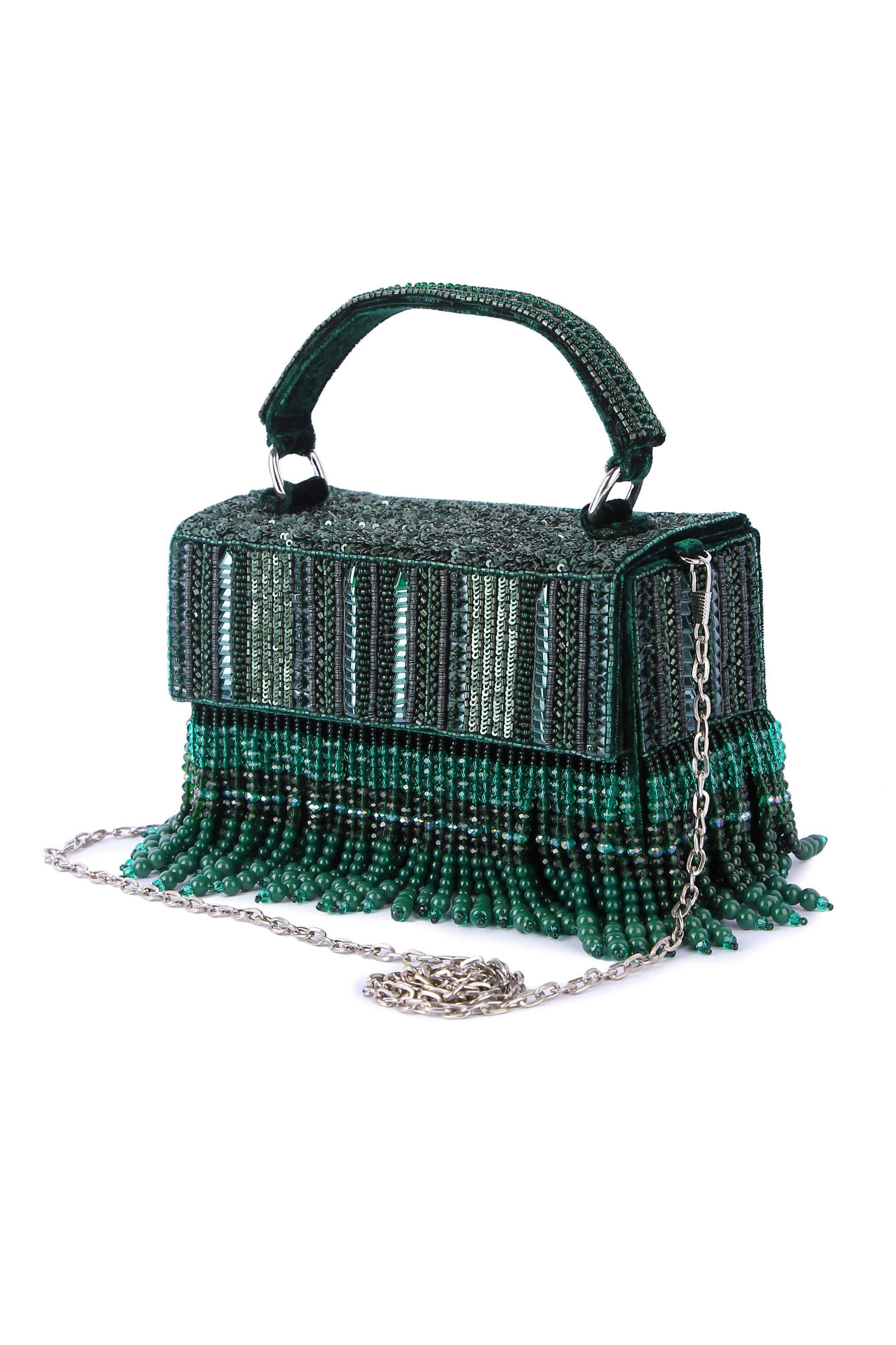 A model showcasing Divirina Green Clutch by The Purple Sack from The Purple Sack's collection A model showcasing Divirina Green Clutch by The Purple Sack from The Purple Sack's collection