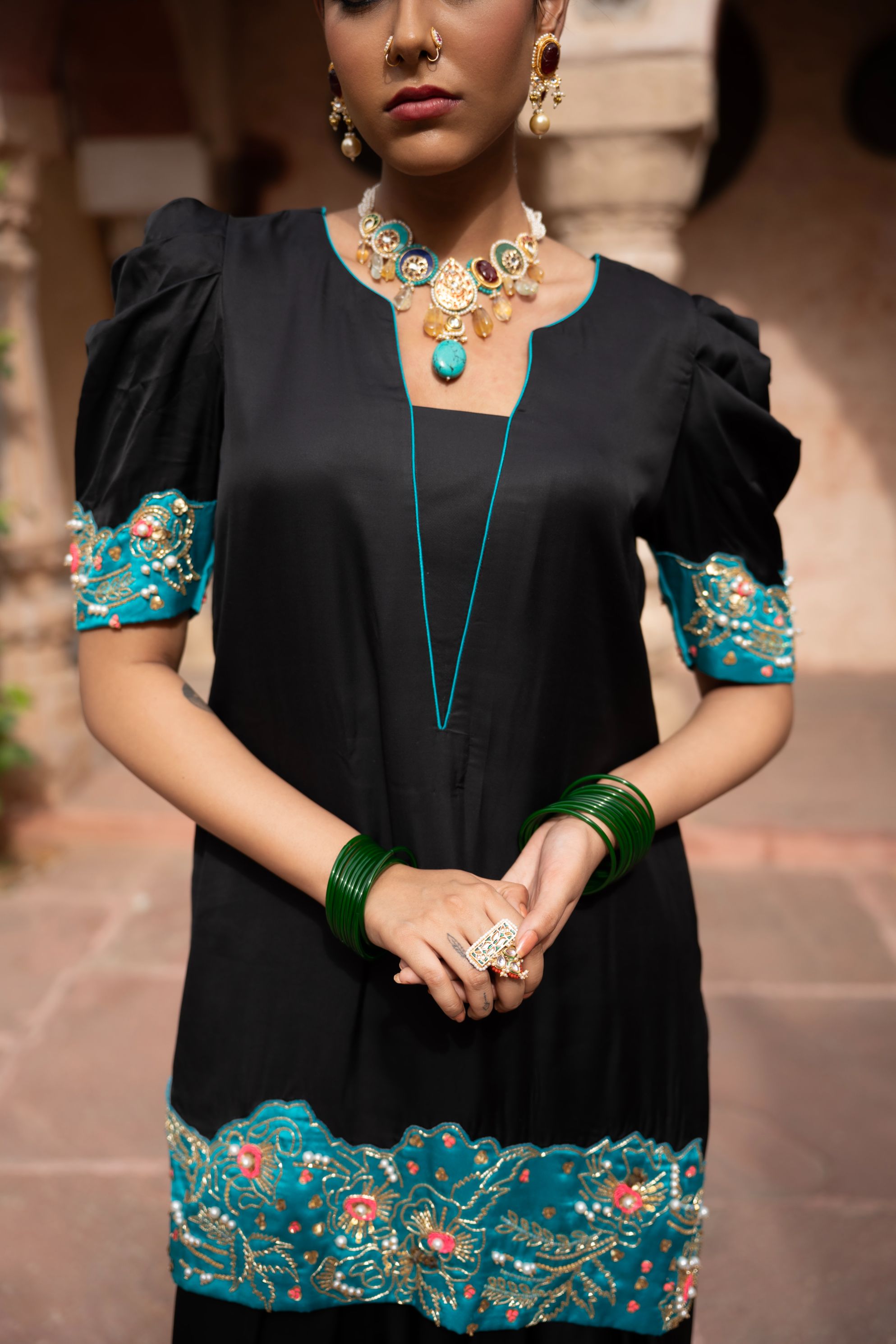 A model showcasing Midnight Noir Handembroidered Farshi Set by Nikunj from Nikunj's collection
