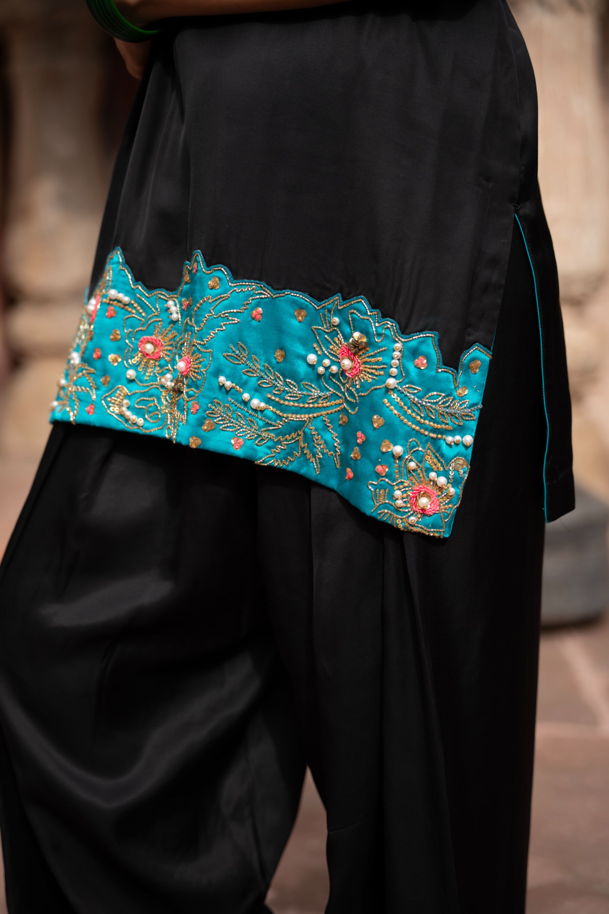 A model showcasing Midnight Noir Handembroidered Farshi Set by Nikunj from Nikunj's collection