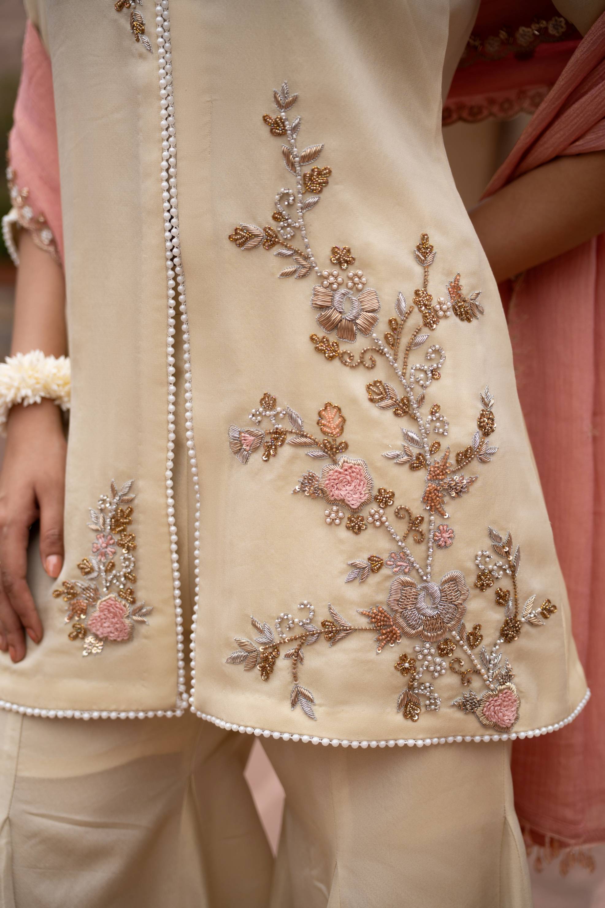 A model showcasing Gulbahaar Handembroidered Gharara Set by Nikunj from Nikunj's collection