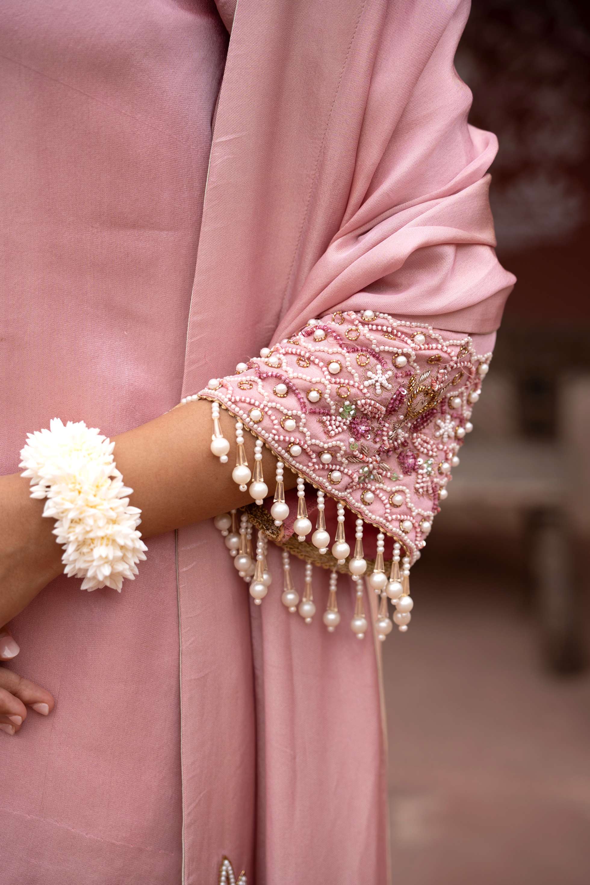 A model showcasing Noor Gulabi Handembroidered Dhoti Set by Nikunj from Nikunj's collection