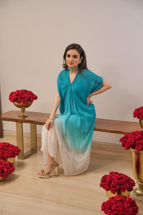 A model showcasing Firoza Shaded Chikankari Dress by Myra By Anju Narian from Myra By Anju Narian's collection A model showcasing Firoza Shaded Chikankari Dress by Myra By Anju Narian from Myra By Anju Narian's collection