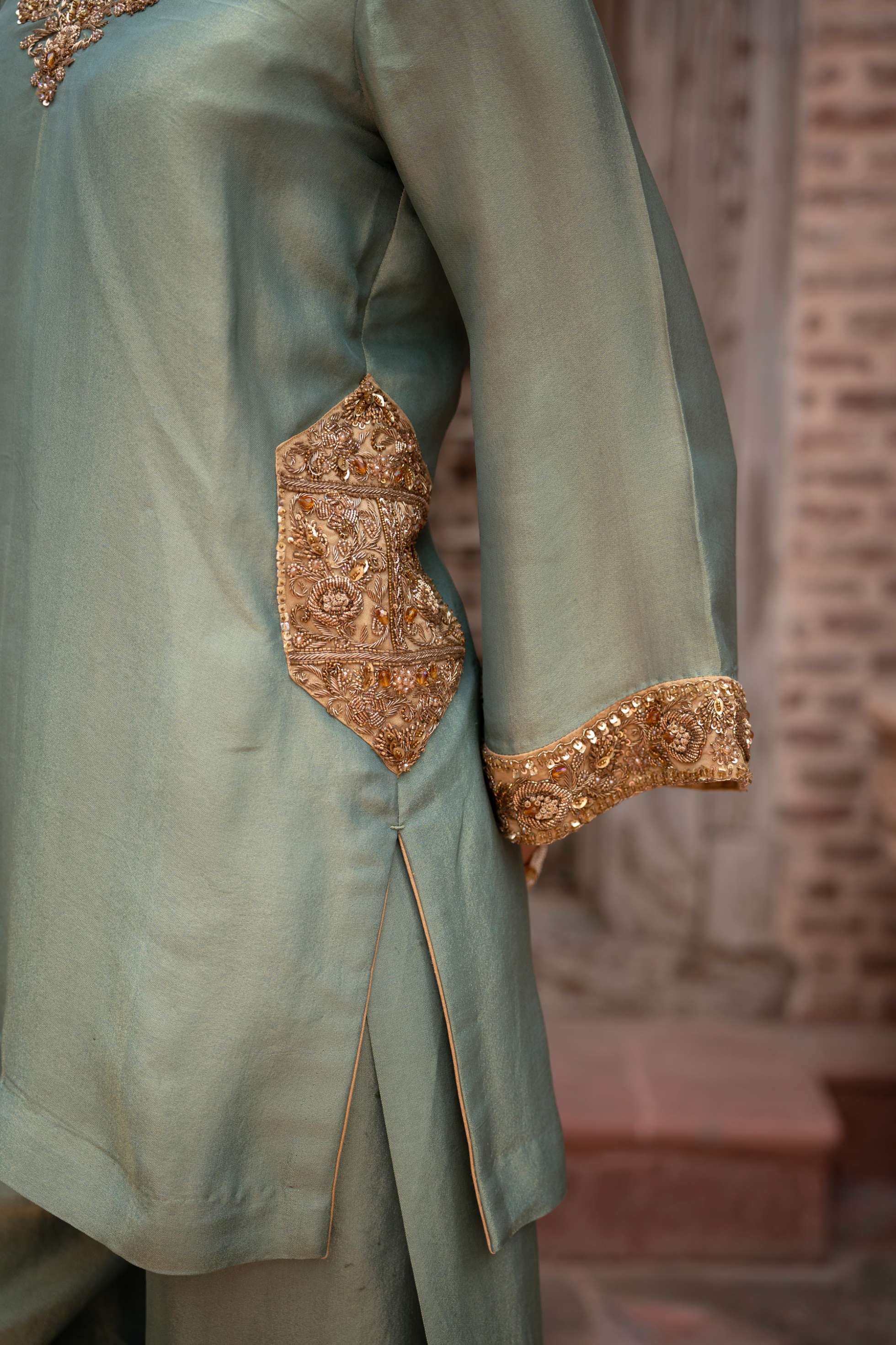 A model showcasing Pista Noor Handembroidered Farshi Set by Nikunj from Nikunj's collection