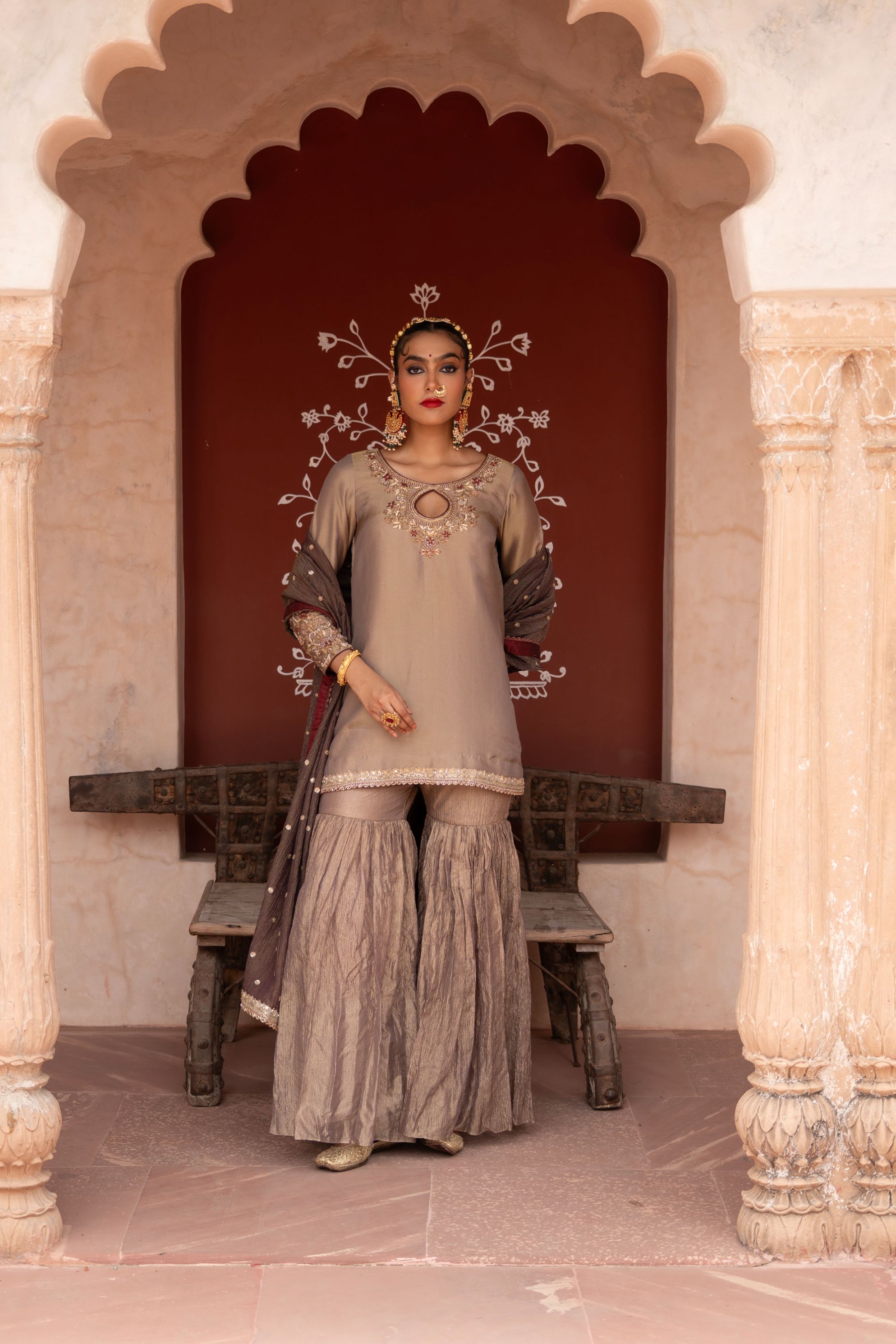 A model showcasing Shahbano Handembroidered Gharara Set by Nikunj from Nikunj's collection