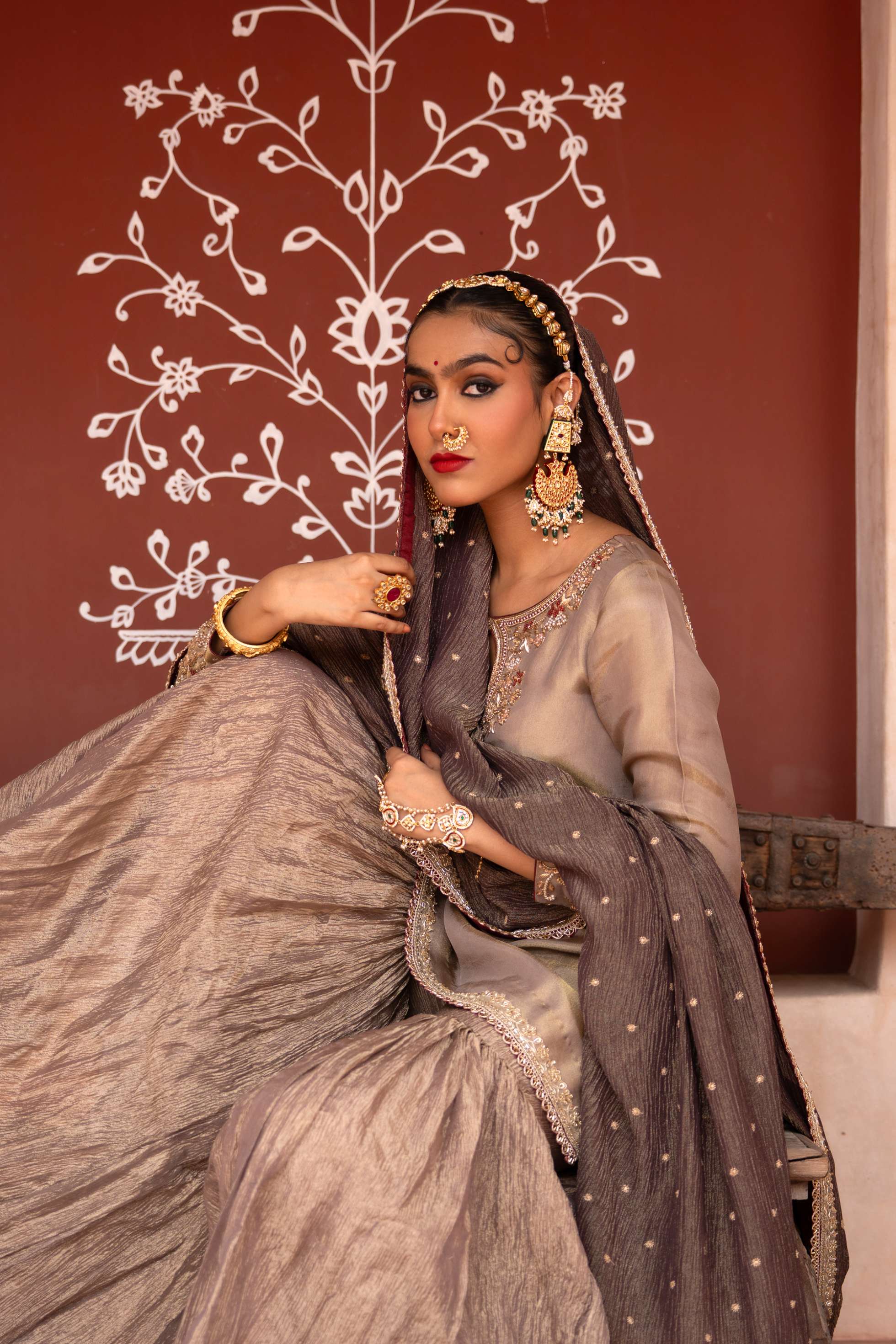 A model showcasing Shahbano Handembroidered Gharara Set by Nikunj from Nikunj's collection