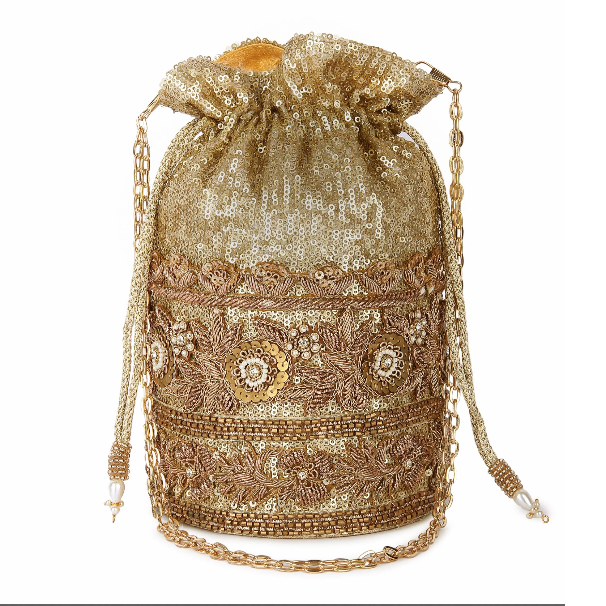 A model showcasing Golden Baliyey Potli by The Purple Sack from The Purple Sack's collection