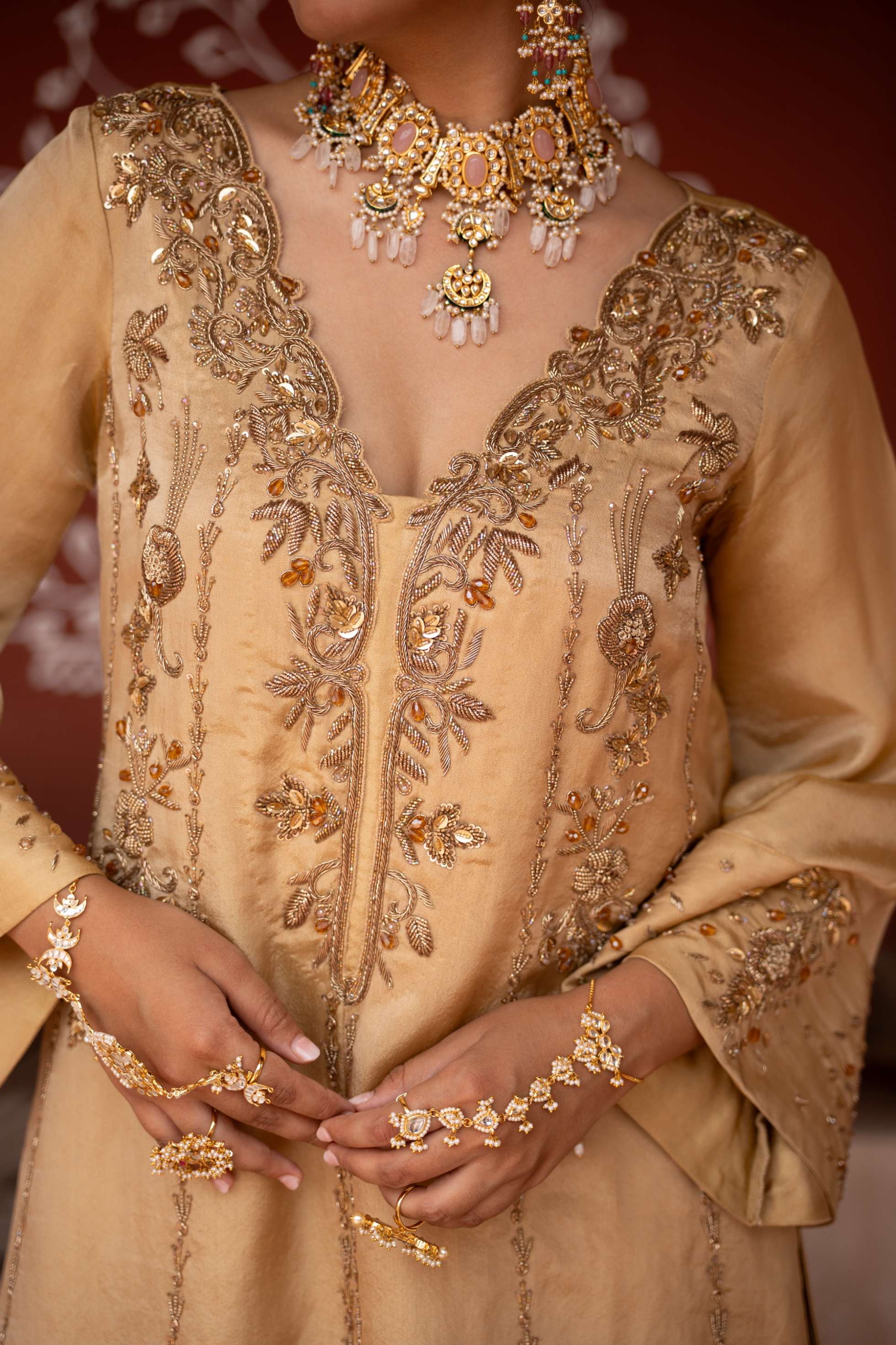 A model showcasing Zar Baari Handembroidered Aline Kurta Set by Nikunj from Nikunj's collection A model showcasing Zar Baari Handembroidered Aline Kurta Set by Nikunj from Nikunj's collection