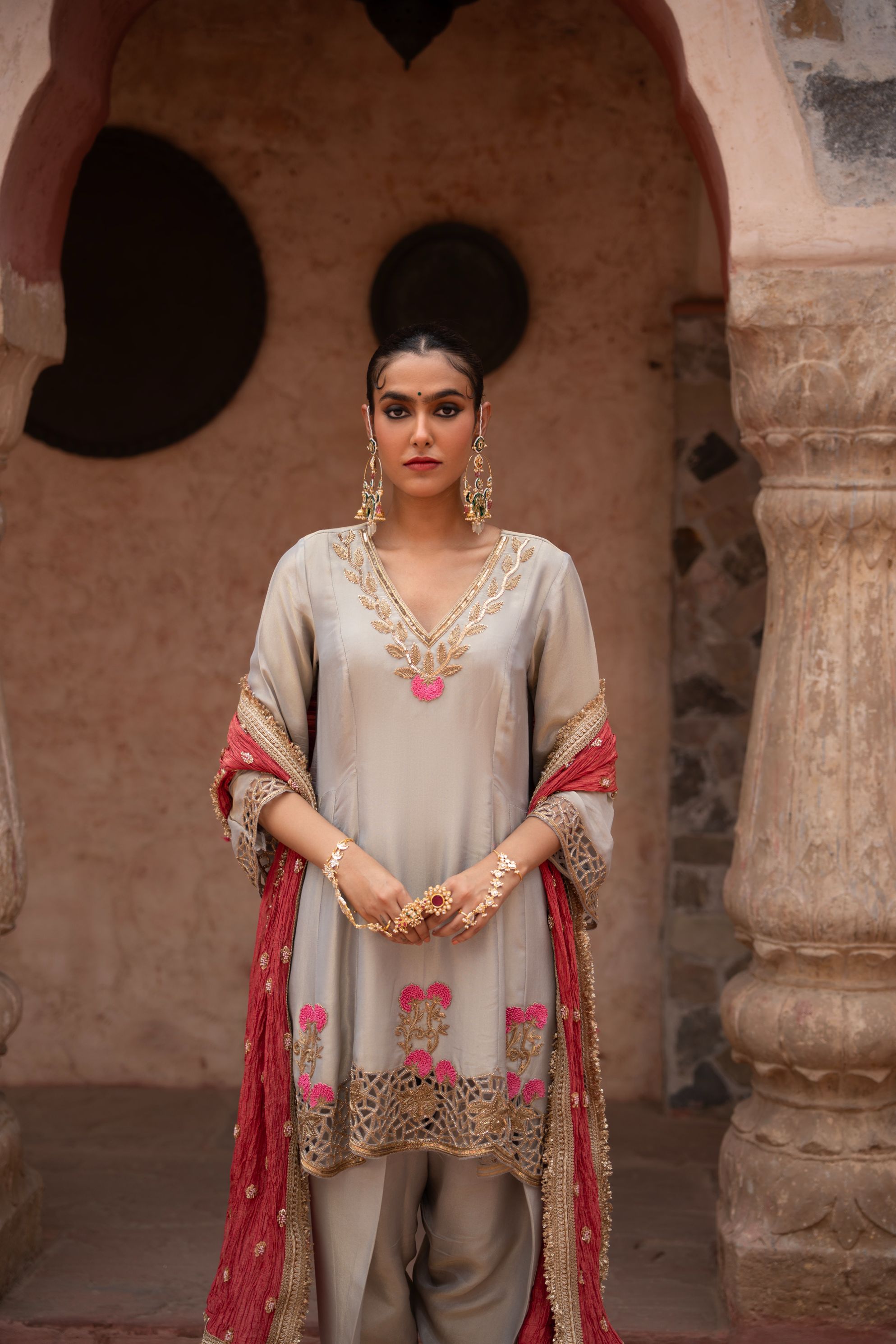 A model showcasing Chaand Baali Hand Embroidered Anarkali Set by Nikunj from Nikunj's collection