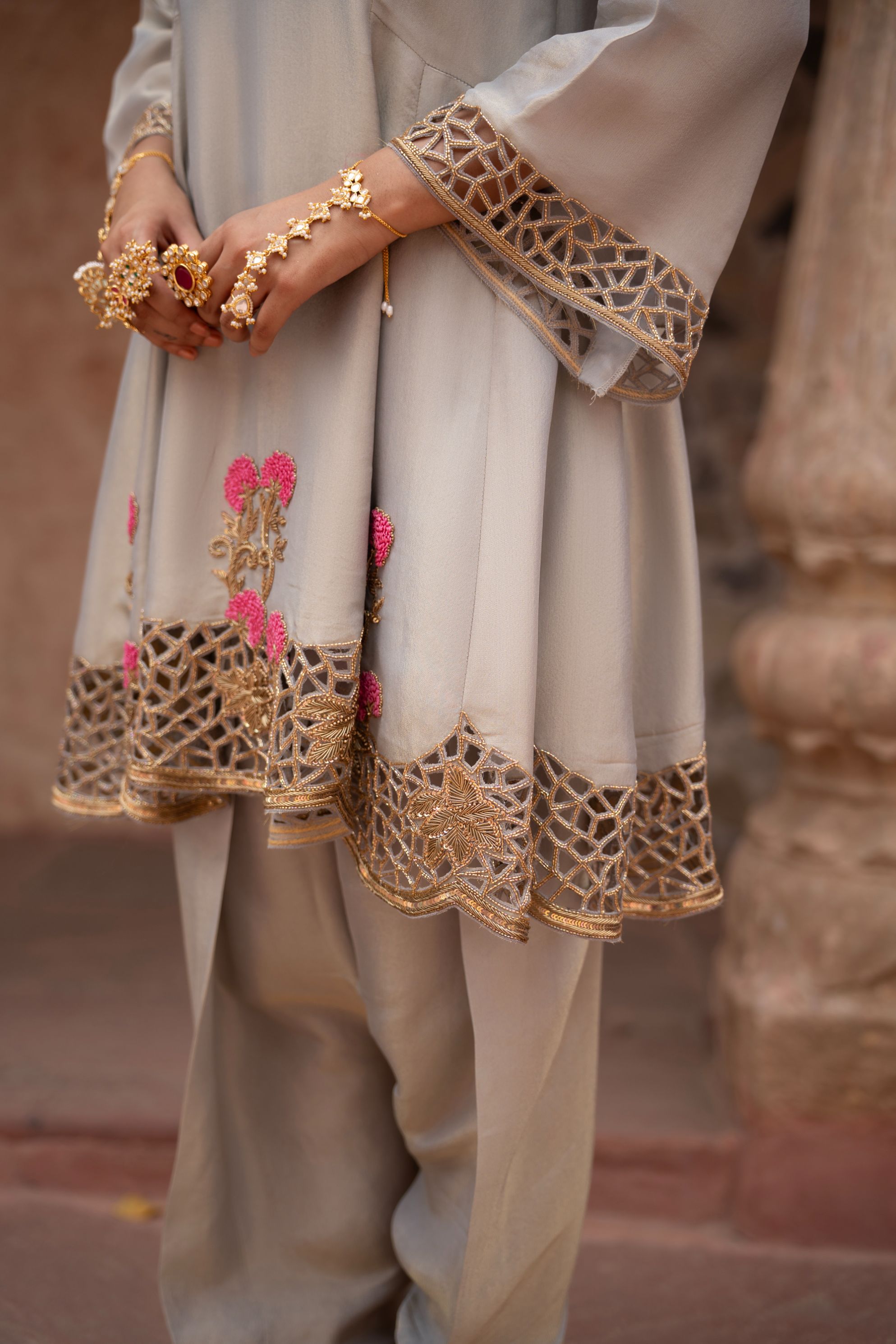 A model showcasing Chaand Baali Hand Embroidered Anarkali Set by Nikunj from Nikunj's collection