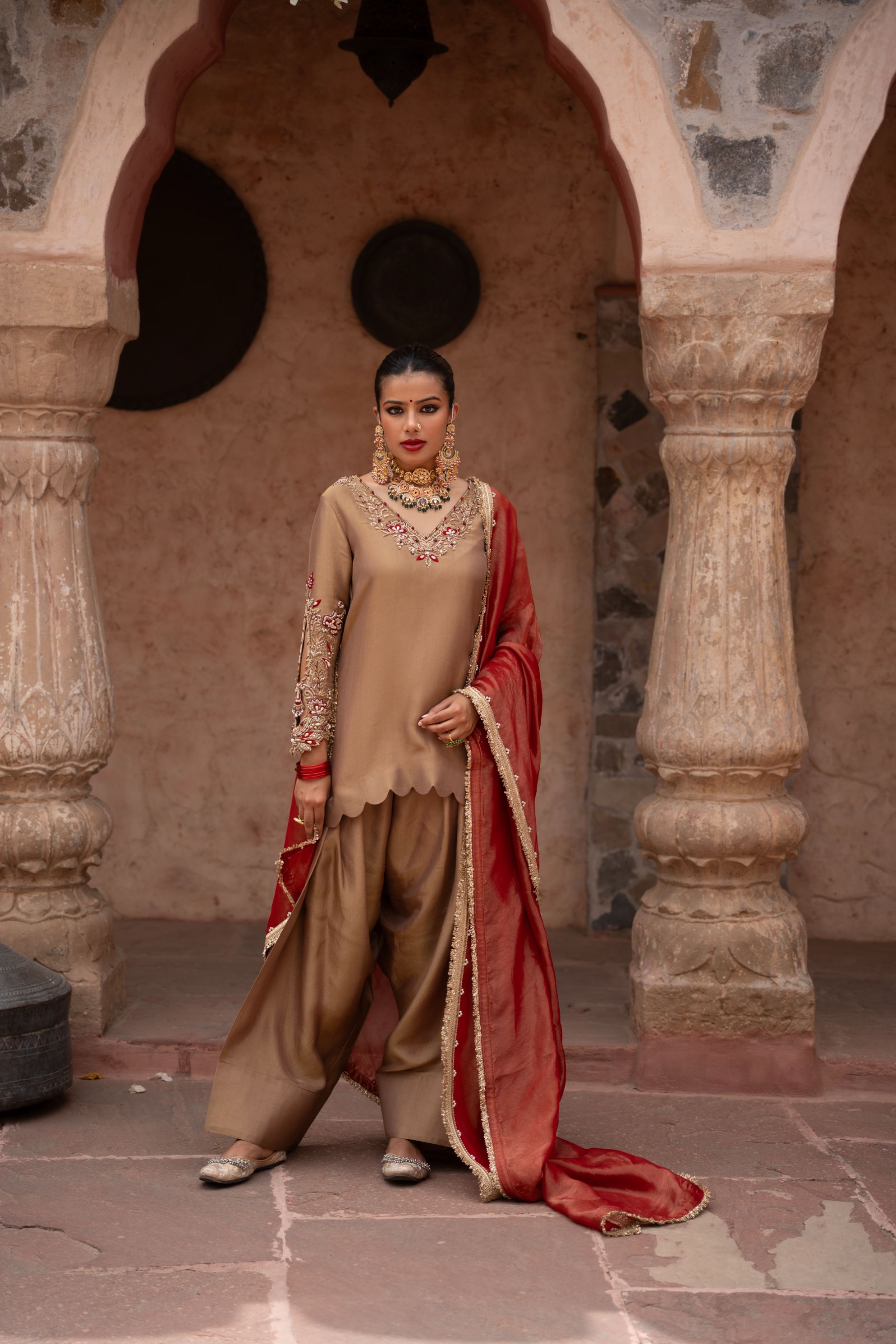 A model showcasing Zehra Handembroidered Farshi Salwar Set by Nikunj from Nikunj's collection