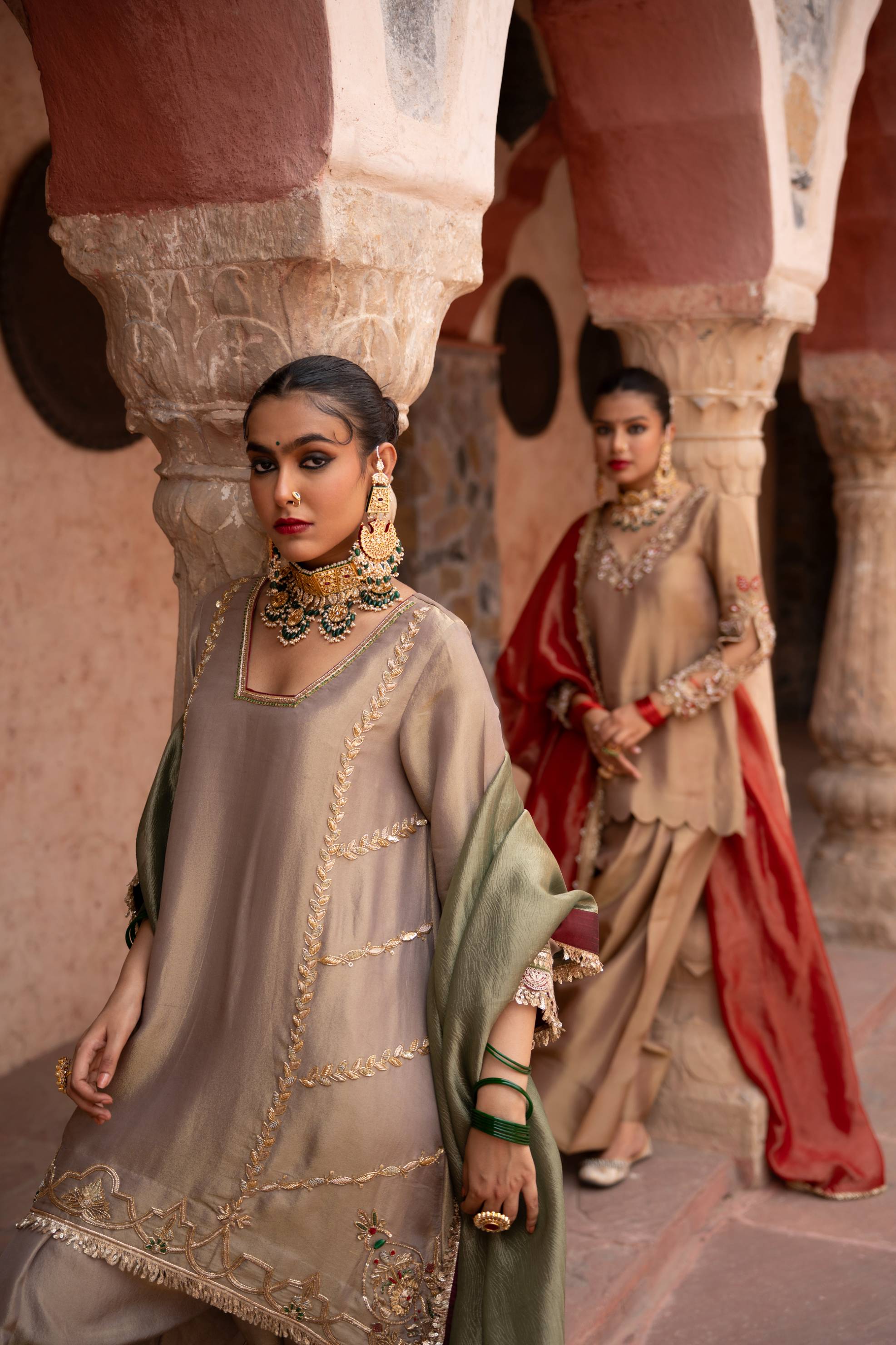 A model showcasing Noor Kaftan Hand Embroidered Salwar Set by Nikunj from Nikunj's collection A model showcasing Noor Kaftan Hand Embroidered Salwar Set by Nikunj from Nikunj's collection
