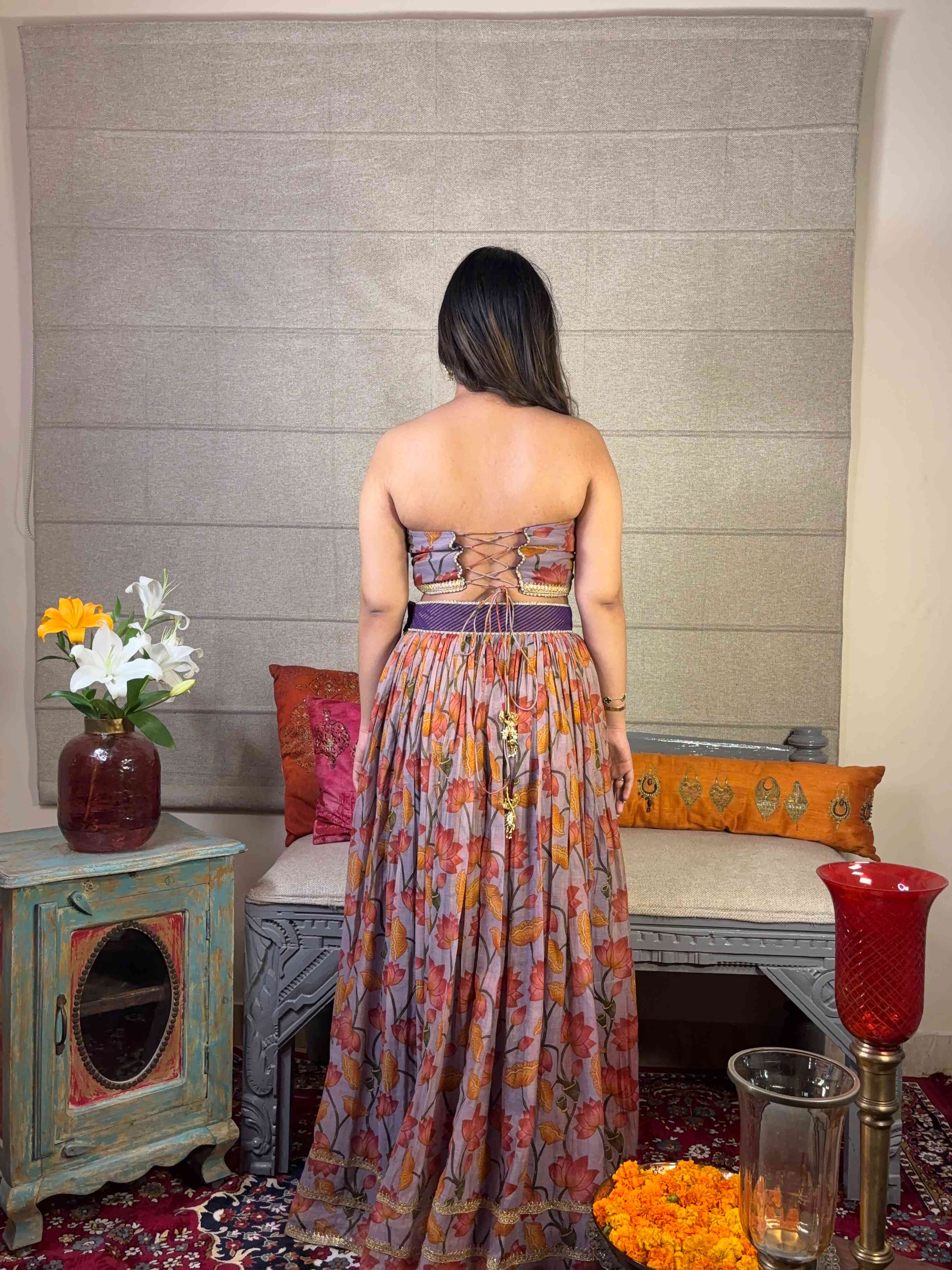 A model showcasing Floral Print Corset Top Skirt Set by Miithhii Elaychii from Miithhii Elaychii's collection