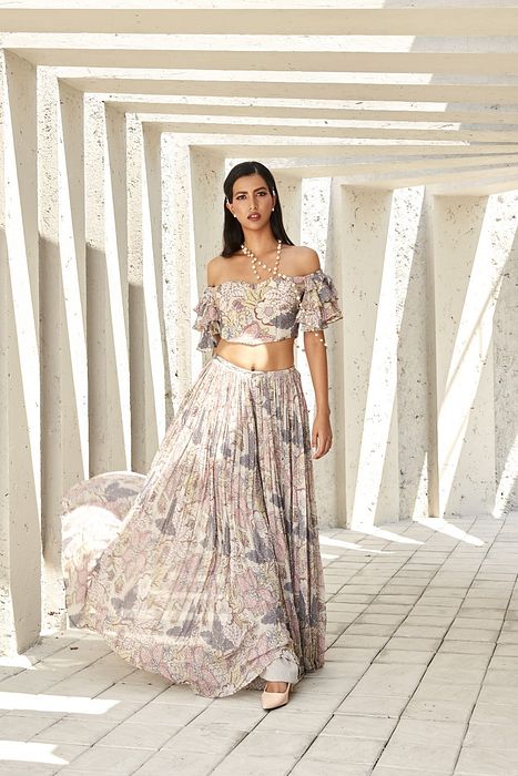A model showcasing Crop Top And Pants by Ranian from Ranian's collection A model showcasing Crop Top And Pants by Ranian from Ranian's collection