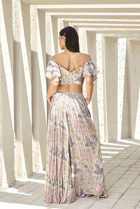 A model showcasing Crop Top And Pants by Ranian from Ranian's collection A model showcasing Crop Top And Pants by Ranian from Ranian's collection