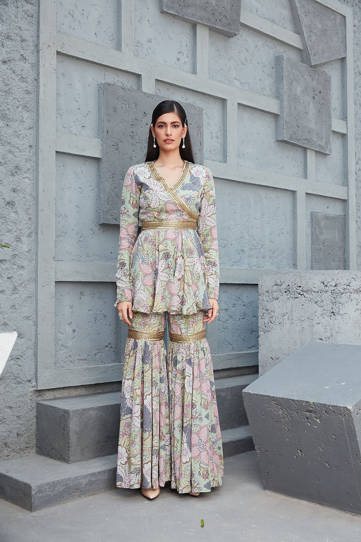 A model showcasing Peplum Garara Set Feature image by Ranian from Ranian's collection