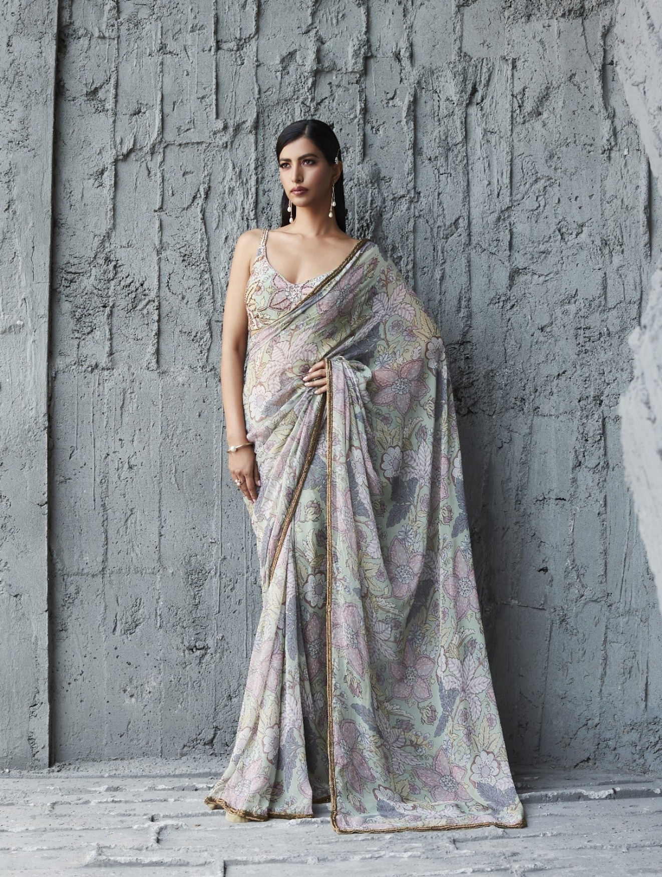 A model showcasing Fluid Georgette Saree Feature image by Ranian from Ranian's collection