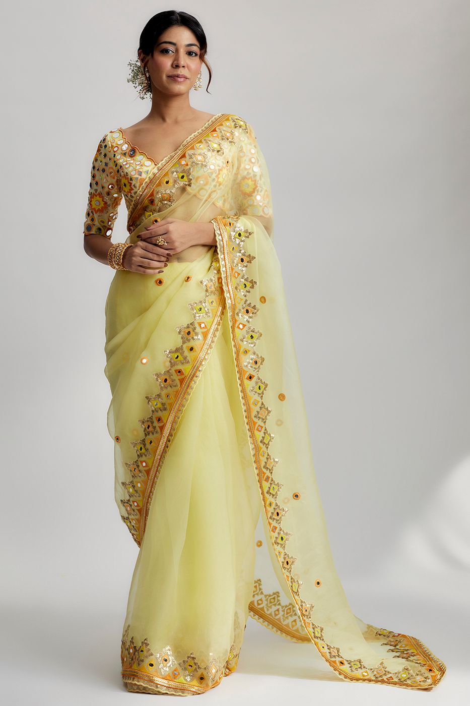 A model showcasing Yellow Priyal Saree Feature image by Gopi Vaid from Gopi Vaid's collection