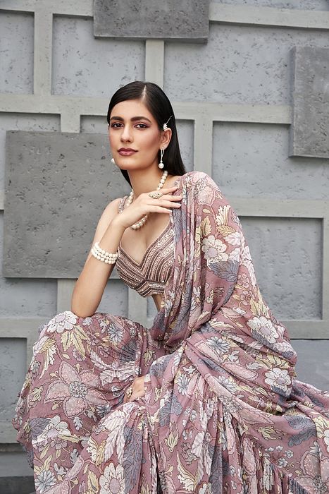 A model showcasing Fluid Drape Saree by Ranian from Ranian's collection A model showcasing Fluid Drape Saree by Ranian from Ranian's collection