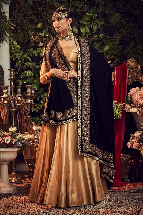 A model showcasing Oxidised Lehenga Set by Ranian from Ranian's collection A model showcasing Oxidised Lehenga Set by Ranian from Ranian's collection