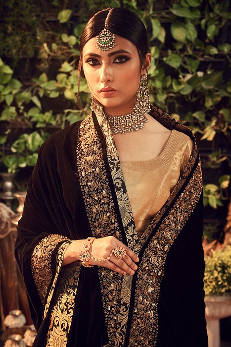 A model showcasing Oxidised Lengha Set With Velvet Dupatta Shawl by Ranian from Ranian's collection A model showcasing Oxidised Lengha Set With Velvet Dupatta Shawl by Ranian from Ranian's collection