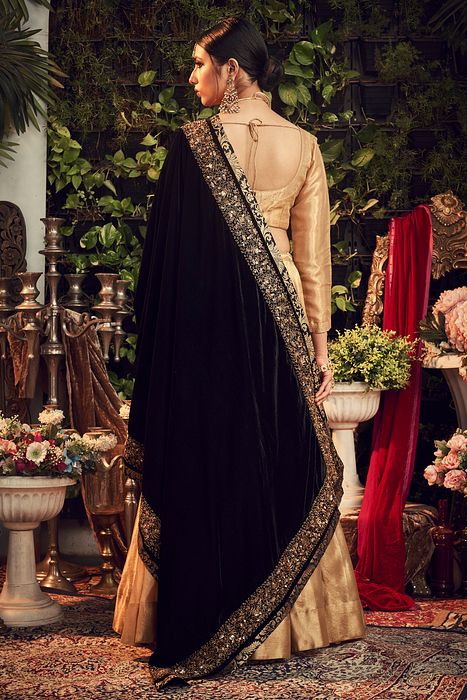 A model showcasing Oxidised Lengha Set With Velvet Dupatta Shawl by Ranian from Ranian's collection A model showcasing Oxidised Lengha Set With Velvet Dupatta Shawl by Ranian from Ranian's collection