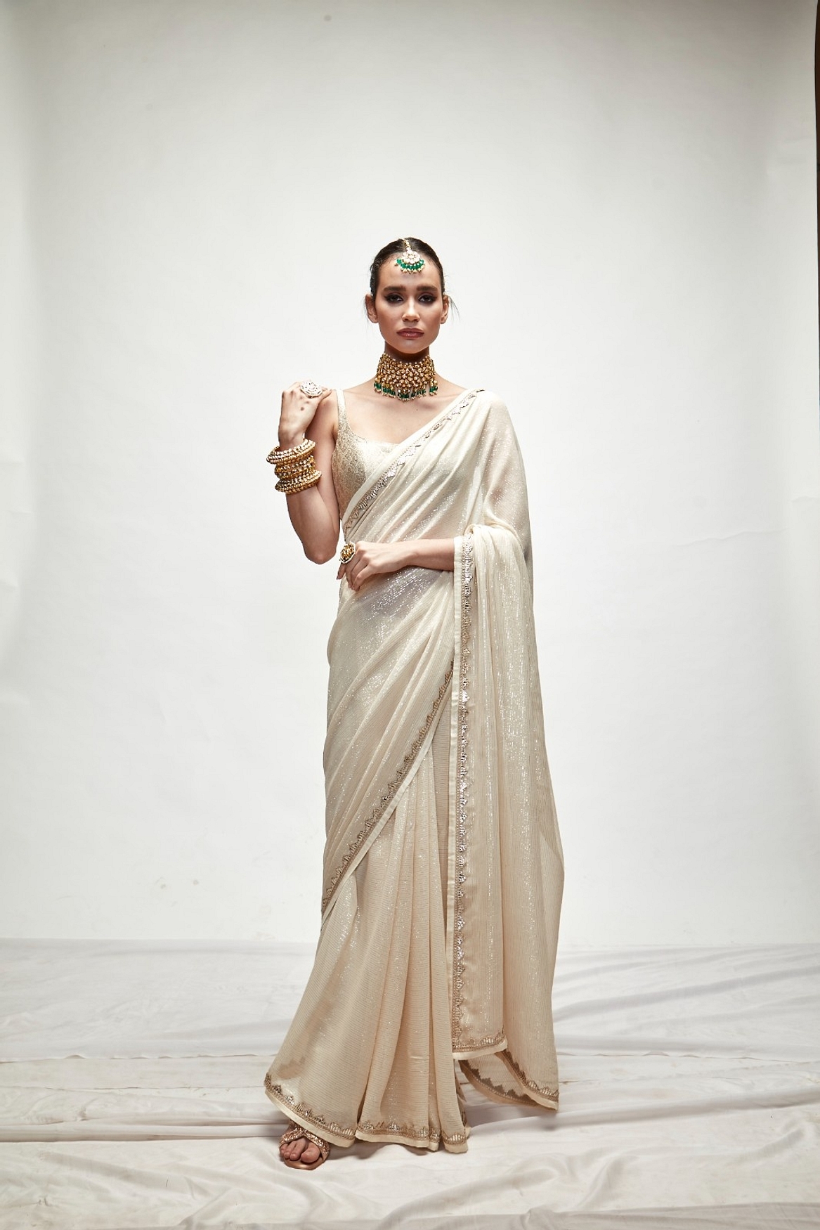 A model showcasing Porcelain Cream Mettalic Saree Set Feature image by Ranian from Ranian's collection