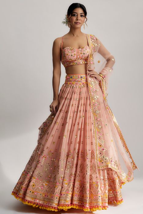 A model showcasing Ruah Gathered Lehenga Set In Pink by Gopi Vaid from Gopi Vaid's collection