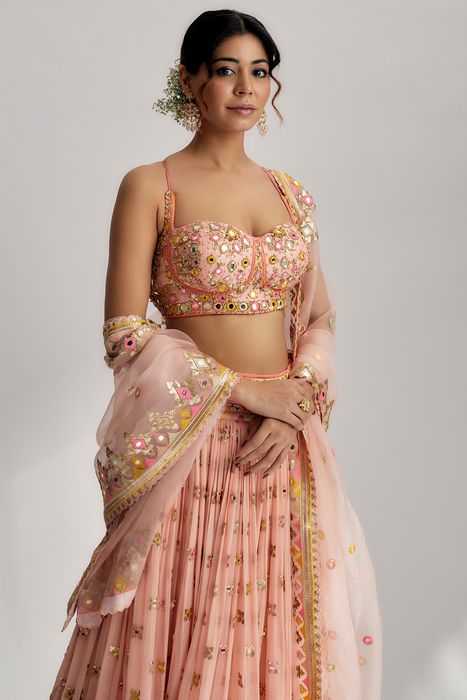 A model showcasing Ruah Gathered Lehenga Set In Pink by Gopi Vaid from Gopi Vaid's collection