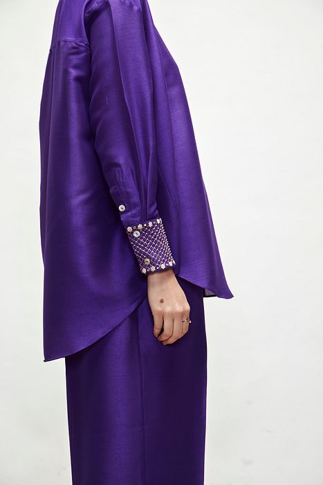 A model showcasing Violet Coord Set by Ranian from Ranian's collection A model showcasing Violet Coord Set by Ranian from Ranian's collection