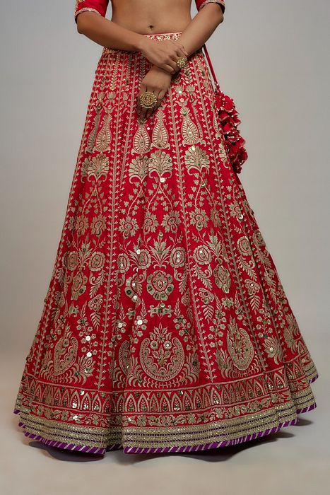 A model showcasing Red Golconda Jasmin Lehenga Set by Gopi Vaid from Gopi Vaid's collection