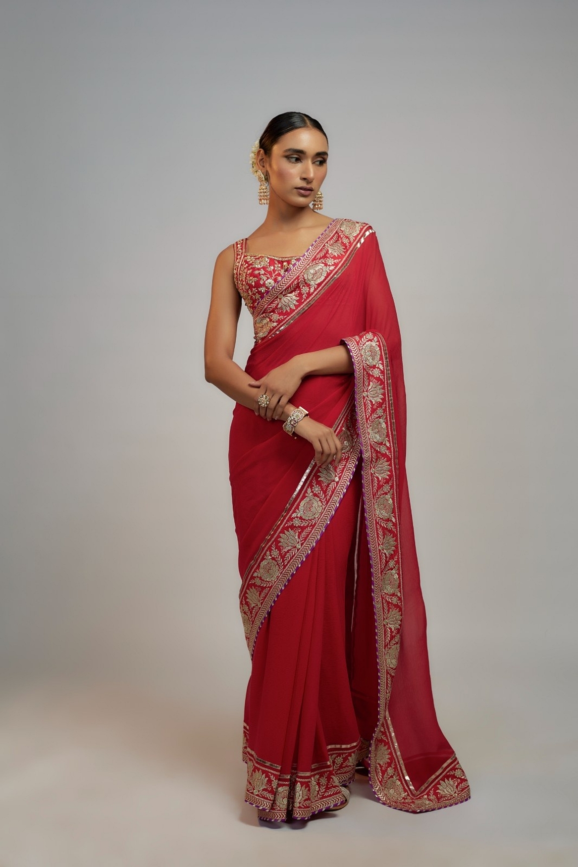 A model showcasing Red Golconda Vidhi Saree Set Feature image by Gopi Vaid from Gopi Vaid's collection