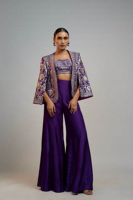 A model showcasing Golconda Purple Sanya Pant Set by Gopi Vaid from Gopi Vaid's collection