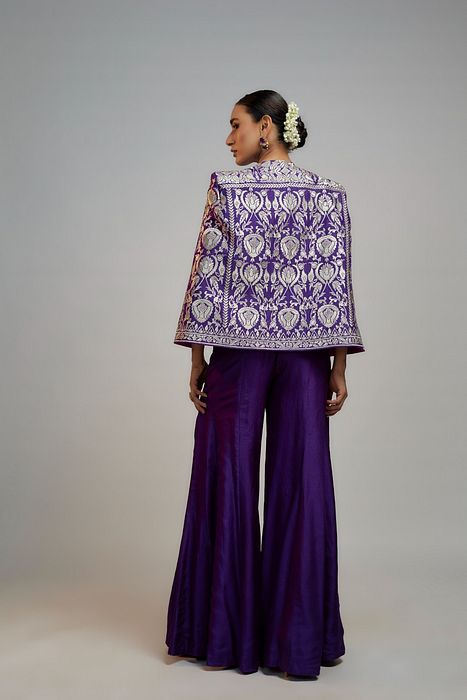 A model showcasing Golconda Purple Sanya Pant Set by Gopi Vaid from Gopi Vaid's collection