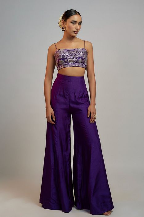 A model showcasing Golconda Purple Sanya Pant Set by Gopi Vaid from Gopi Vaid's collection