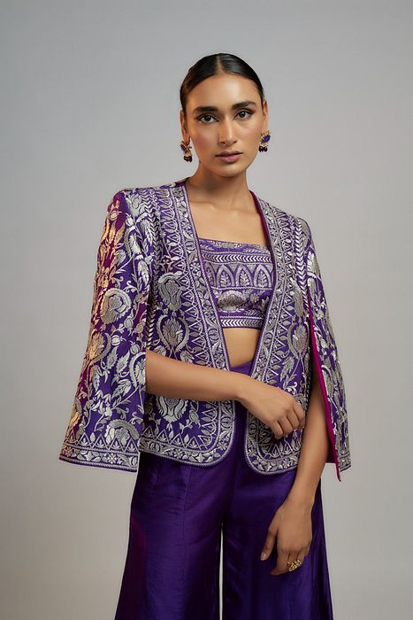 A model showcasing Golconda Purple Sanya Pant Set by Gopi Vaid from Gopi Vaid's collection