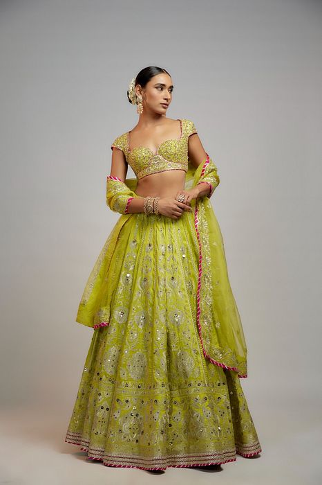 A model showcasing Golconda Lime Green Nayla Lehenga Set by Gopi Vaid from Gopi Vaid's collection