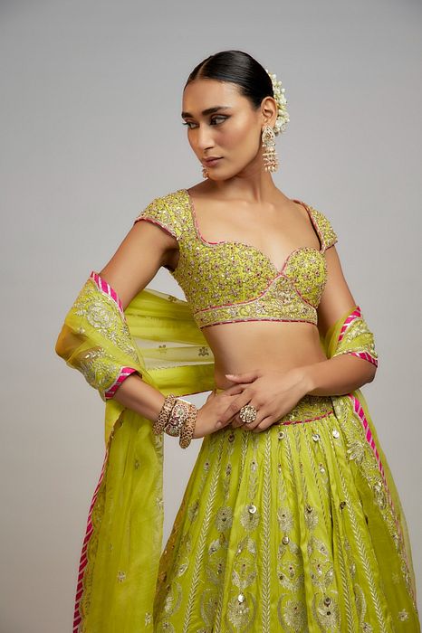 A model showcasing Golconda Lime Green Nayla Lehenga Set by Gopi Vaid from Gopi Vaid's collection