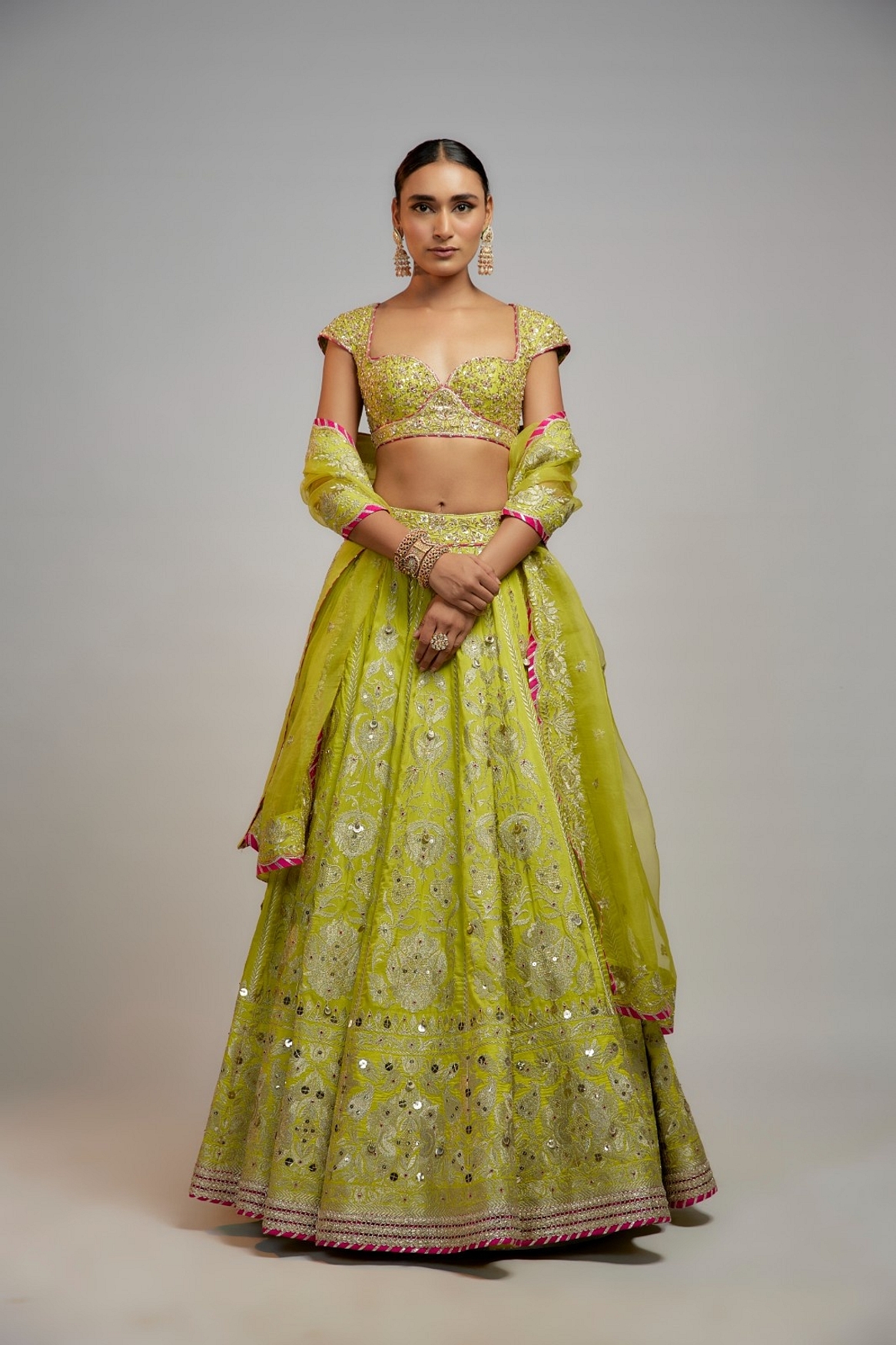 A model showcasing Golconda Lime Green Nayla Lehenga Set Feature image by Gopi Vaid from Gopi Vaid's collection