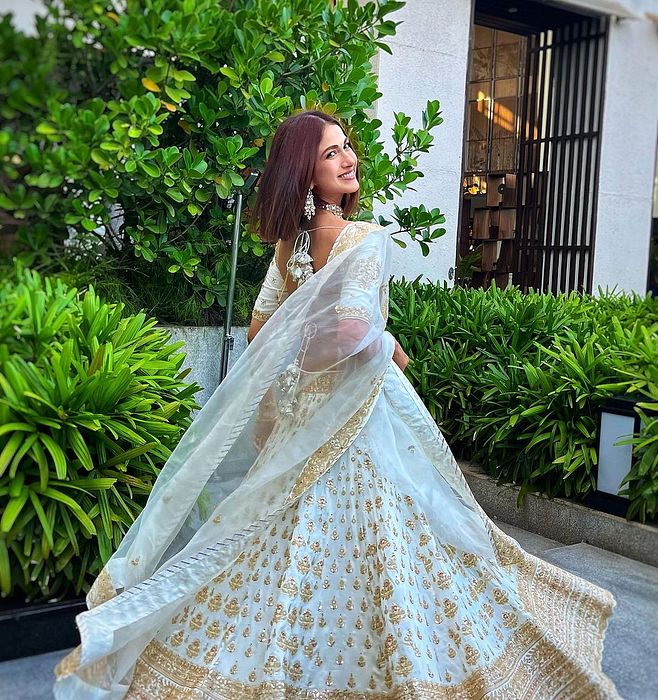 A model showcasing Reha Sukheja In Golconda Shahi Lehenga Set by Gopi Vaid from Gopi Vaid's collection