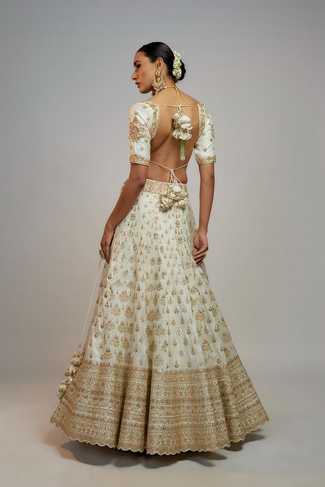 A model showcasing Reha Sukheja In Golconda Shahi Lehenga Set by Gopi Vaid from Gopi Vaid's collection