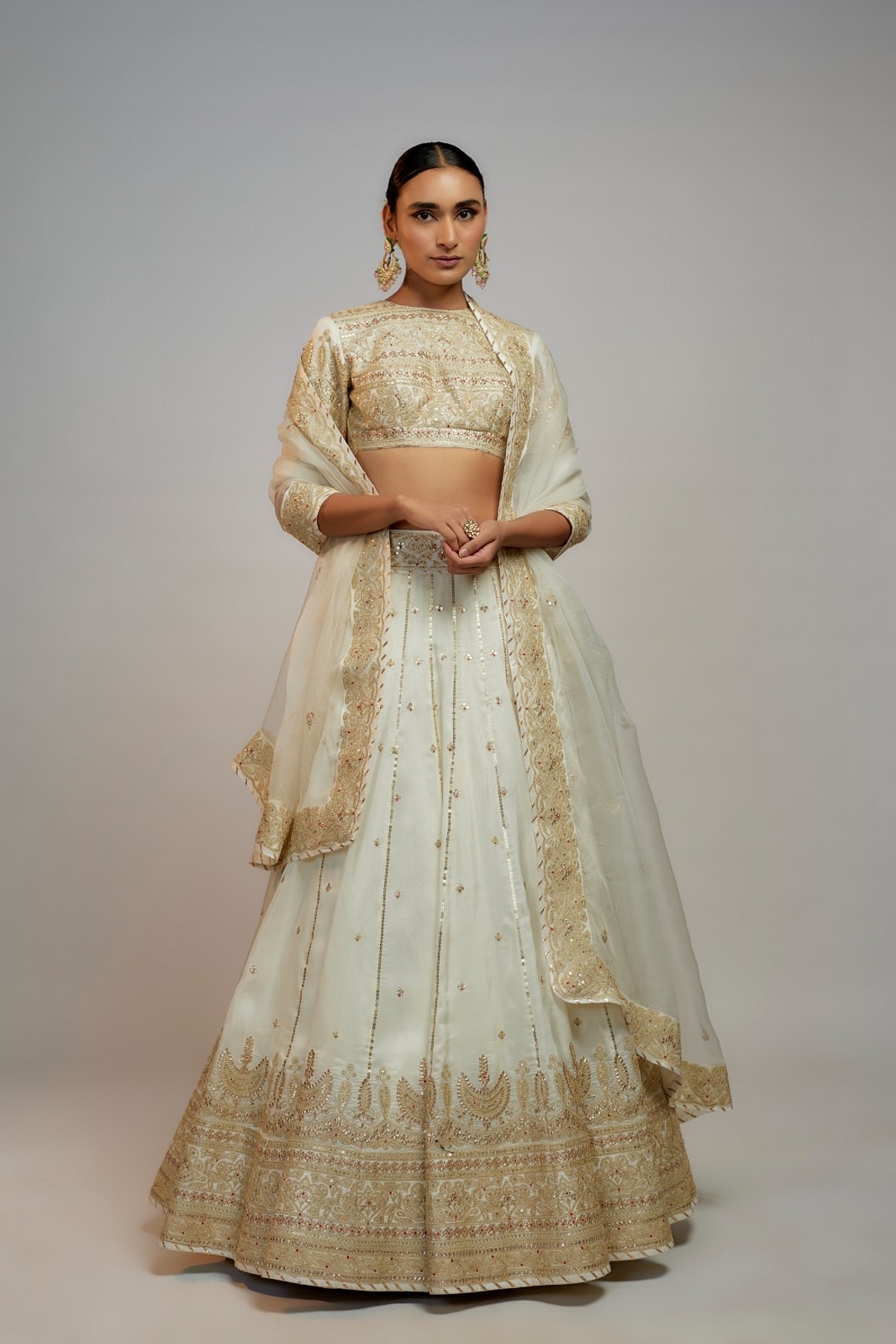 A model showcasing Golconda White Naima Lehenga Set Feature image by Gopi Vaid from Gopi Vaid's collection