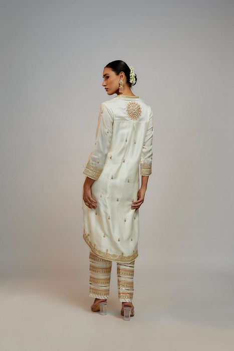 A model showcasing Golconda White Tahira Pant Set by Gopi Vaid from Gopi Vaid's collection